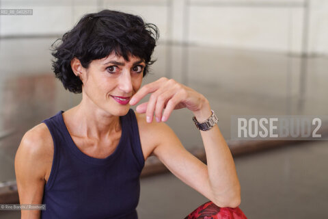 Biella September 12, 2026..Eleni Molos—actress, voice actor, author of essays and educational texts, and writer—photographed in Biella at the former De Agostini factory complex during the Fuoriluogo Festival/Eleni Molos, attrice, doppiatrice, autrice disaggi e testi per la scuola, scrittrice, fotografata a Biella negli spazi dellEx Opicicio De Agostini durante il Festival Fuoriluogo. ©Rino Bianchi/Rosebud2