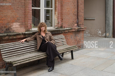 Turin September 30, 2026..Elena Varvello—poet, writer, and instructor at the Scuola Holden—photographed on the schools premises within the former Cavalli Barracks at the Turin Military Arsenal in the Borgo Dora district/Elena Varvello poetessa, scrittrice, docente della Scuola Holden, fotografata negli spazi della scuola nellex lex Caserma Cavalli dellArsenale militare di Torino, a Borgo Dora. ©Rino Bianchi/Rosebud2