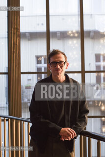 Turin October 10, 2026..Nicola Lagioia—Italian writer, radio host, and director of the Turin International Book Fair from 2017 to 2023—photographed in the foyer of the Teatro Regio in Turin during the Portici di Carta event/Nicola Lagioia scrittore, conduttore radiofonico italiano, direttore del Salone internazionale del libro di Torino dal 2017 al 2023, fotografato a Torino nel Foyer del Regio durante Portici di Carta. ©Rino Bianchi/Rosebud2