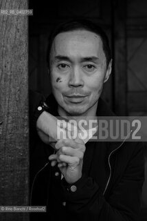 Turin October 11, 2026..Tash Aw, a Malaysian writer of Chinese ethnicity born in Taiwan, photographed in Turin inside the Church of San Filippo Neri during the Portici di Carta event/Tash Aw, scrittore malese di etnia cinese nato a Taiwan, fotografato a Torino negli spazi della chiesa San Filippo Neri durante Portici di carta ©Rino Bianchi/Rosebud2
