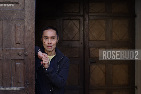 Turin October 11, 2026..Tash Aw, a Malaysian writer of Chinese ethnicity born in Taiwan, photographed in Turin inside the Church of San Filippo Neri during the Portici di Carta event/Tash Aw, scrittore malese di etnia cinese nato a Taiwan, fotografato a Torino negli spazi della chiesa San Filippo Neri durante Portici di carta ©Rino Bianchi/Rosebud2