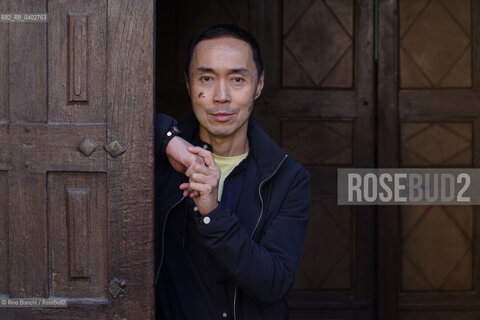 Turin October 11, 2026..Tash Aw, a Malaysian writer of Chinese ethnicity born in Taiwan, photographed in Turin inside the Church of San Filippo Neri during the Portici di Carta event/Tash Aw, scrittore malese di etnia cinese nato a Taiwan, fotografato a Torino negli spazi della chiesa San Filippo Neri durante Portici di carta ©Rino Bianchi/Rosebud2