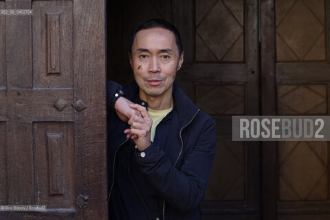 Turin October 11, 2026..Tash Aw, a Malaysian writer of Chinese ethnicity born in Taiwan, photographed in Turin inside the Church of San Filippo Neri during the Portici di Carta event/Tash Aw, scrittore malese di etnia cinese nato a Taiwan, fotografato a Torino negli spazi della chiesa San Filippo Neri durante Portici di carta ©Rino Bianchi/Rosebud2