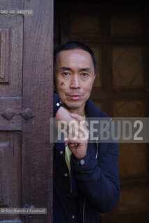 Turin October 11, 2026..Tash Aw, a Malaysian writer of Chinese ethnicity born in Taiwan, photographed in Turin inside the Church of San Filippo Neri during the Portici di Carta event/Tash Aw, scrittore malese di etnia cinese nato a Taiwan, fotografato a Torino negli spazi della chiesa San Filippo Neri durante Portici di carta ©Rino Bianchi/Rosebud2