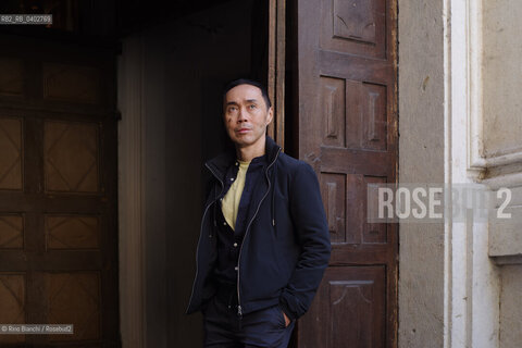 Turin October 11, 2026..Tash Aw, a Malaysian writer of Chinese ethnicity born in Taiwan, photographed in Turin inside the Church of San Filippo Neri during the Portici di Carta event/Tash Aw, scrittore malese di etnia cinese nato a Taiwan, fotografato a Torino negli spazi della chiesa San Filippo Neri durante Portici di carta ©Rino Bianchi/Rosebud2