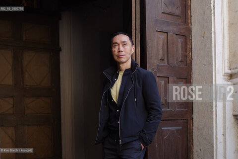 Turin October 11, 2026..Tash Aw, a Malaysian writer of Chinese ethnicity born in Taiwan, photographed in Turin inside the Church of San Filippo Neri during the Portici di Carta event/Tash Aw, scrittore malese di etnia cinese nato a Taiwan, fotografato a Torino negli spazi della chiesa San Filippo Neri durante Portici di carta ©Rino Bianchi/Rosebud2