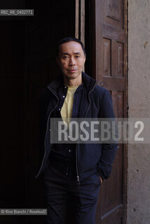 Turin October 11, 2026..Tash Aw, a Malaysian writer of Chinese ethnicity born in Taiwan, photographed in Turin inside the Church of San Filippo Neri during the Portici di Carta event/Tash Aw, scrittore malese di etnia cinese nato a Taiwan, fotografato a Torino negli spazi della chiesa San Filippo Neri durante Portici di carta ©Rino Bianchi/Rosebud2
