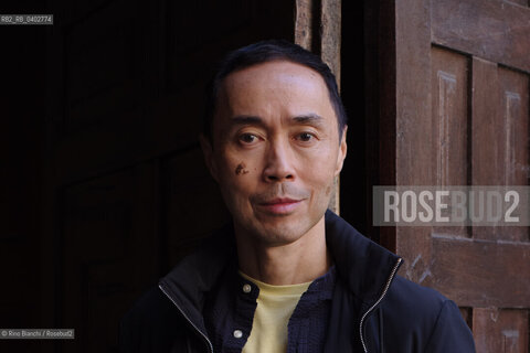Turin October 11, 2026..Tash Aw, a Malaysian writer of Chinese ethnicity born in Taiwan, photographed in Turin inside the Church of San Filippo Neri during the Portici di Carta event/Tash Aw, scrittore malese di etnia cinese nato a Taiwan, fotografato a Torino negli spazi della chiesa San Filippo Neri durante Portici di carta ©Rino Bianchi/Rosebud2