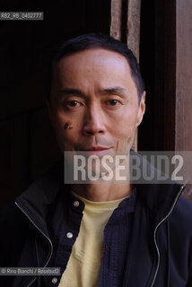 Turin October 11, 2026..Tash Aw, a Malaysian writer of Chinese ethnicity born in Taiwan, photographed in Turin inside the Church of San Filippo Neri during the Portici di Carta event/Tash Aw, scrittore malese di etnia cinese nato a Taiwan, fotografato a Torino negli spazi della chiesa San Filippo Neri durante Portici di carta ©Rino Bianchi/Rosebud2