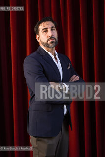 Turin October 9, 2026..Piergiorgio Pulixi, a writer and author of thrillers and noir fiction, photographed in Turin at the Circolo dei Lettori/Piergiorgio Pulixi, scrittore, autore di thriller e noir, fotografato a Torino negli ambienti del Circolo dei lettori. ©Rino Bianchi/Rosebud2