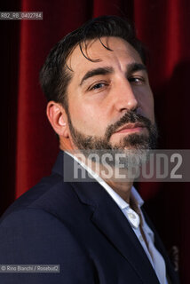Turin October 9, 2026..Piergiorgio Pulixi, a writer and author of thrillers and noir fiction, photographed in Turin at the Circolo dei Lettori/Piergiorgio Pulixi, scrittore, autore di thriller e noir, fotografato a Torino negli ambienti del Circolo dei lettori. ©Rino Bianchi/Rosebud2