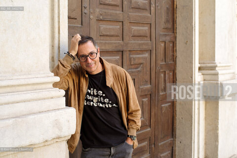 Turin October 11, 2026..Luca Bianchini—writer, advertising professional, freelance copywriter, and radio host—photographed in front of the Church of San Filippo Neri in Turin during the Portici di Carta event/Luca Bianchini scrittore, pubblicitario, copywriter free-lance, conduttore radiofonico, fotografato dinanzi alla chiesa di San Filippo Neri a Torino durante Portici di carta. ©Rino Bianchi/Rosebud2