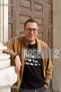 Turin October 11, 2026..Luca Bianchini—writer, advertising professional, freelance copywriter, and radio host—photographed in front of the Church of San Filippo Neri in Turin during the Portici di Carta event/Luca Bianchini scrittore, pubblicitario, copywriter free-lance, conduttore radiofonico, fotografato dinanzi alla chiesa di San Filippo Neri a Torino durante Portici di carta. ©Rino Bianchi/Rosebud2