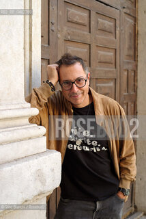 Turin October 11, 2026..Luca Bianchini—writer, advertising professional, freelance copywriter, and radio host—photographed in front of the Church of San Filippo Neri in Turin during the Portici di Carta event/Luca Bianchini scrittore, pubblicitario, copywriter free-lance, conduttore radiofonico, fotografato dinanzi alla chiesa di San Filippo Neri a Torino durante Portici di carta. ©Rino Bianchi/Rosebud2