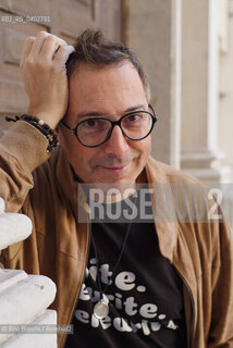 Turin October 11, 2026..Luca Bianchini—writer, advertising professional, freelance copywriter, and radio host—photographed in front of the Church of San Filippo Neri in Turin during the Portici di Carta event/Luca Bianchini scrittore, pubblicitario, copywriter free-lance, conduttore radiofonico, fotografato dinanzi alla chiesa di San Filippo Neri a Torino durante Portici di carta. ©Rino Bianchi/Rosebud2