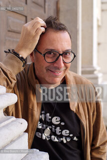Turin October 11, 2026..Luca Bianchini—writer, advertising professional, freelance copywriter, and radio host—photographed in front of the Church of San Filippo Neri in Turin during the Portici di Carta event/Luca Bianchini scrittore, pubblicitario, copywriter free-lance, conduttore radiofonico, fotografato dinanzi alla chiesa di San Filippo Neri a Torino durante Portici di carta. ©Rino Bianchi/Rosebud2