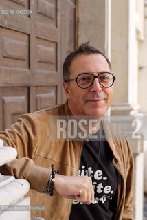 Turin October 11, 2026..Luca Bianchini—writer, advertising professional, freelance copywriter, and radio host—photographed in front of the Church of San Filippo Neri in Turin during the Portici di Carta event/Luca Bianchini scrittore, pubblicitario, copywriter free-lance, conduttore radiofonico, fotografato dinanzi alla chiesa di San Filippo Neri a Torino durante Portici di carta. ©Rino Bianchi/Rosebud2
