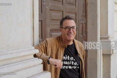 Turin October 11, 2026..Luca Bianchini—writer, advertising professional, freelance copywriter, and radio host—photographed in front of the Church of San Filippo Neri in Turin during the Portici di Carta event/Luca Bianchini scrittore, pubblicitario, copywriter free-lance, conduttore radiofonico, fotografato dinanzi alla chiesa di San Filippo Neri a Torino durante Portici di carta. ©Rino Bianchi/Rosebud2