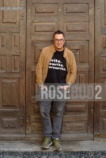 Turin October 11, 2026..Luca Bianchini—writer, advertising professional, freelance copywriter, and radio host—photographed in front of the Church of San Filippo Neri in Turin during the Portici di Carta event/Luca Bianchini scrittore, pubblicitario, copywriter free-lance, conduttore radiofonico, fotografato dinanzi alla chiesa di San Filippo Neri a Torino durante Portici di carta. ©Rino Bianchi/Rosebud2