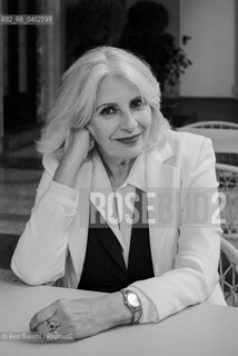 Turin October 10, 2026..Anna Pavignano—writer, screenwriter, and author of novels, short stories, and works for children and young adults—was the life and professional partner of Massimo Troisi, co-writing all the films of the Neapolitan actor and director. An Academy Award nominee, she is pictured here in Turin at the Gallerie d’Italia during the *Portici di Carta* event/Anna Pavignano, scrittrice, sceneggiatrice, autrice di romanzi, racconti e testi per bambini e ragazzi, compagna di vita e di lavoro di Massimo Troisi sceneggiando tutti i film dell’attore e regista napoletano, candidata al Premio Oscar, fotografata a Torino negli spazi delle Gallerie dItalia durante Portici di Carta. ©Rino Bianchi/Rosebud2