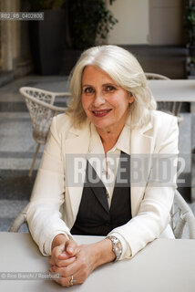 Turin October 10, 2026..Anna Pavignano—writer, screenwriter, and author of novels, short stories, and works for children and young adults—was the life and professional partner of Massimo Troisi, co-writing all the films of the Neapolitan actor and director. An Academy Award nominee, she is pictured here in Turin at the Gallerie d’Italia during the *Portici di Carta* event/Anna Pavignano, scrittrice, sceneggiatrice, autrice di romanzi, racconti e testi per bambini e ragazzi, compagna di vita e di lavoro di Massimo Troisi sceneggiando tutti i film dell’attore e regista napoletano, candidata al Premio Oscar, fotografata a Torino negli spazi delle Gallerie dItalia durante Portici di Carta. ©Rino Bianchi/Rosebud2