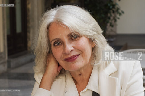 Turin October 10, 2026..Anna Pavignano—writer, screenwriter, and author of novels, short stories, and works for children and young adults—was the life and professional partner of Massimo Troisi, co-writing all the films of the Neapolitan actor and director. An Academy Award nominee, she is pictured here in Turin at the Gallerie d’Italia during the *Portici di Carta* event/Anna Pavignano, scrittrice, sceneggiatrice, autrice di romanzi, racconti e testi per bambini e ragazzi, compagna di vita e di lavoro di Massimo Troisi sceneggiando tutti i film dell’attore e regista napoletano, candidata al Premio Oscar, fotografata a Torino negli spazi delle Gallerie dItalia durante Portici di Carta. ©Rino Bianchi/Rosebud2