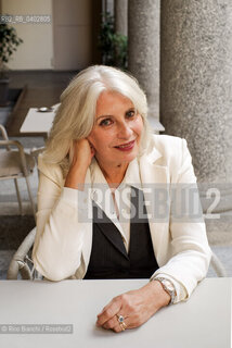 Turin October 10, 2026..Anna Pavignano—writer, screenwriter, and author of novels, short stories, and works for children and young adults—was the life and professional partner of Massimo Troisi, co-writing all the films of the Neapolitan actor and director. An Academy Award nominee, she is pictured here in Turin at the Gallerie d’Italia during the *Portici di Carta* event/Anna Pavignano, scrittrice, sceneggiatrice, autrice di romanzi, racconti e testi per bambini e ragazzi, compagna di vita e di lavoro di Massimo Troisi sceneggiando tutti i film dell’attore e regista napoletano, candidata al Premio Oscar, fotografata a Torino negli spazi delle Gallerie dItalia durante Portici di Carta. ©Rino Bianchi/Rosebud2