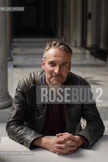 Turin October 11, 2026..Marco Amerighi—writer, translator, and editor—photographed in Turin at the Gallerie d’Italia/Marco Amerighi, scrittore, traduttore, curatore editoriale, fotografato a Torino negli spazi delle Galleri dItalia. ©Rino Bianchi/Rosebud2