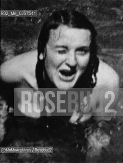 Eva Braun (1912-1945), companion of German dictator Adolf Hitler, filmed by himself in the water of a Bavarian lake / Eva Braun (1912-1945), compagna del dittatore tedesco Adolf Hitler, filmata da lui nellacqua di un lago bavarese - Reproduced by MaMoArchives/Rosebud2