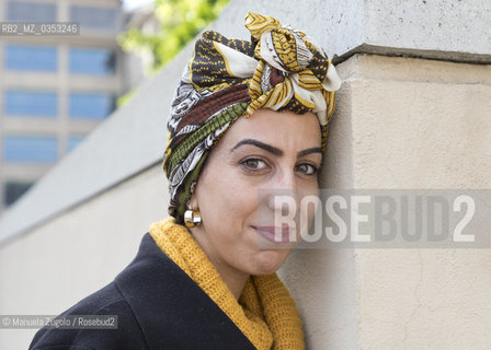 Faïza Guène, scrittrice francese. Nasce nel 1985 a Bobigny, in Francia, da genitori di origine algerina, e cresce a Pantin,  dove conosce la realtà del sottobosco urbano che spinge poveri e immigrati all’auto-emarginazione.Si è imposta come una delle voci più originali della letteratura francese .contemporanea. Presente a Torino al Salone Internazionale del Libro/a French writer. He was born in 1985 in Bobigny, France, from parents of Algerian origin, and grows in Pantin, where he knows the reality of the urban undergrowth that drives poor and immigrants to self-marginalization. He is set as one of the most original voices in French literature Contemporary. Present at Turin International Book Fair.Only for editorial use / Solo per uso editoriale. ©Manuela Zugolo/Rosebud2