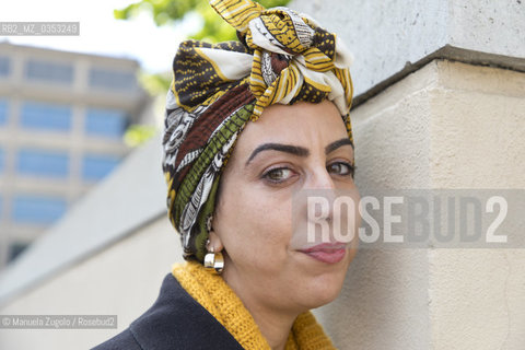 Faïza Guène, scrittrice francese. Nasce nel 1985 a Bobigny, in Francia, da genitori di origine algerina, e cresce a Pantin,  dove conosce la realtà del sottobosco urbano che spinge poveri e immigrati all’auto-emarginazione.Si è imposta come una delle voci più originali della letteratura francese .contemporanea. Presente a Torino al Salone Internazionale del Libro/a French writer. He was born in 1985 in Bobigny, France, from parents of Algerian origin, and grows in Pantin, where he knows the reality of the urban undergrowth that drives poor and immigrants to self-marginalization. He is set as one of the most original voices in French literature Contemporary. Present at Turin International Book Fair.Only for editorial use / Solo per uso editoriale. ©Manuela Zugolo/Rosebud2