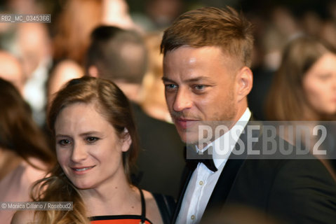 Tom Wlaschiha e Julia Jentsch sul red carpet del 69° Festival del Cinema di Cannes, maggio 2016. Tom Wlaschiha and Julia Jentsch on the red carpet during the 69th Annual Cannes Film Festival at the Palais des Festivals on May 14, 2016. ©Monica Cillario/Rosebud2