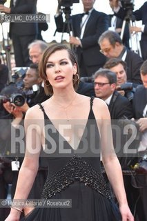 Milla Jovovich  sul red carpet del Palais des Festivals per la premiere di The Last Face durante la 69esima edizione del Festival del Cinema di Cannes, maggio 2016. Milla Jovovich attends The Last Face Premiere during the 69th annual Cannes Film Festival at the Palais des Festivals on May 20, 2016 ©Monica Cillario/Rosebud2