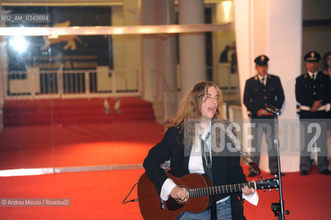 Patti Smith, Us singer-songwriter, poet, and visual artist during her performance on red carpet of the Movie Palace in Venice 04 september 2011, at the 68th International Film Festival. ©Andrea Merola/Rosebud2