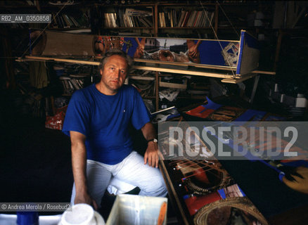 Ludovico De Luigi, pittore surrealista veneziano, posa nel suo studio a Venezia,  luglio 1985..Italian painter Ludovico De Luigi poses inside his atelier in Venice, july 1985. ©Andrea Merola/Rosebud2