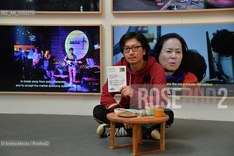 Lartista sud coreano Lee Wan posa accanto alle sue video opere esposte nel Padiglione della Repubblica di Korea, alla 57° edizione della  Biennale Arte di Venezia, 9 maggio 2017. .South Korean artist Lee Wan poses next his artistic video work, inside Korea Pavilion, at Biennale Modern Art in Venice, may 09, 2017. ©Andrea Merola/Rosebud2