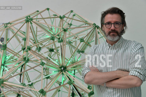 Lartista danese Olafur Eliasson posa accanto una sua opera, intitolate Green Light, nel Padiglione Centrale, alla 57° edizione della  Biennale Arte di Venezia, 9 maggio 2017. .Danish artist Olafur Eliasson poses next his artistic works, titled Green Light, inside Central Pavilion, at Biennale Modern Art in Venice, may 09, 2017. ©Andrea Merola/Rosebud2