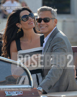 Amal Alamuddin e George Clooney , a Venezia per sposarsi, fotografati durante la corsa in motoscafo verso lhotel Cipriani, 26 settembre 2014..Amal Alamuddin and George Clooney, in Venice to get married, photographed during the speedboat ride to the hotel Cipriani, 26 September 2014. ©Andrea Merola/Rosebud2