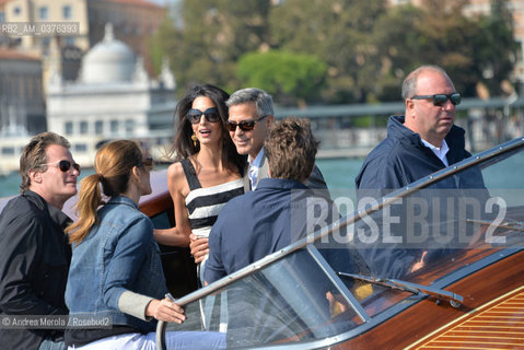 Sx-Dx: Rande Gerber, Cindy Crowford, Amal Alamuddin e George Clooney , a Venezia per sposarsi, fotografati durante la corsa in motoscafo verso lhotel Cipriani, 26 settembre 2014..L-R: Rende Gerber, Cindy Crowford, Amal Alamuddin and George Clooney, in Venice to get married, photographed during the speedboat ride to the hotel Cipriani, 26 September 2014. ©Andrea Merola/Rosebud2