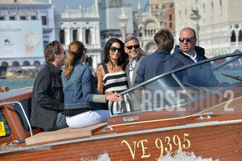 Amal Alamuddin e George Clooney , a Venezia per sposarsi, fotografati durante la corsa in motoscafo verso lhotel Cipriani, 26 settembre 2014..Amal Alamuddin and George Clooney, in Venice to get married, photographed during the speedboat ride to the hotel Cipriani, 26 September 2014. ©Andrea Merola/Rosebud2