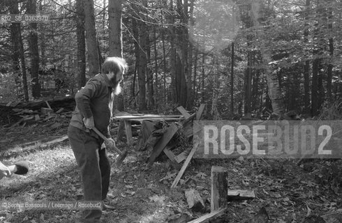 30 Oct 1983, Maine, USA --- Aleksandr Solzhenitsyn Chopping Wood  ©Sophie Bassouls/Leemage/Rosebud2