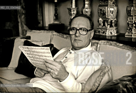 Photo Cosima Scavolini/Rosebud2.Rome, Nineties.Composer Ennio Morricone posing in his house in Rome in the nineties.In the photo Ennio Morricone ©Cosima Scavolini/Rosebud2