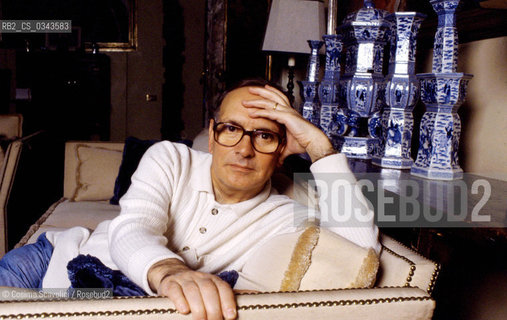 Photo Cosima Scavolini/Rosebud2.Rome, Nineties.Composer Ennio Morricone posing in his house in Rome in the nineties.In the photo Ennio Morricone ©Cosima Scavolini/Rosebud2