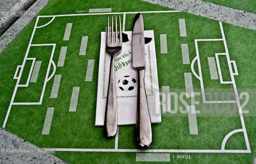 OFFSIDE (behind the scenes of soccer heaven).in the reportage you can see what youll never see on television.  A trip inside the secrets of the professional world of soccer where  actors are not only the players. 2000-2008.in the picture: table in a restaurant in bern durinf euro 2008 ©Alberto Ramella/Rosebud2