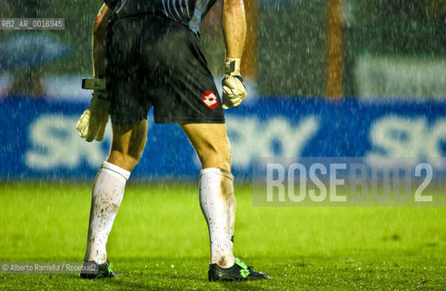 OFFSIDE (behind the scenes of soccer heaven).in the reportage you can see what youll never see on television.  A trip inside the secrets of the professional world of soccer where  actors are not only the players. 2000-2008.in the picture: a goal keeper i action at siena franchi stadium ©Alberto Ramella/Rosebud2