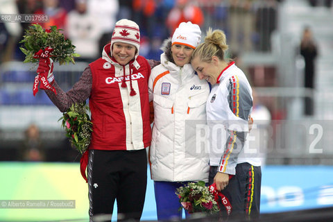 speed skating 1000m ladies the podium marianne timmer, ned,  gold, klassen cindy, can, silver, anni friesinger, ger, bronze ©Alberto Ramella/Rosebud2