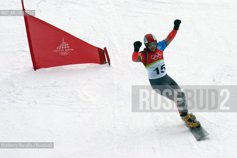 two brothers from switzerland philip and simon schoch won gold and silver medal, bronze for austrian siegfried grabner in snowboard psg, bardonecchia- in the pict the winner philip schoch ©Alberto Ramella/Rosebud2