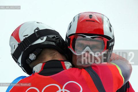 two brothers from switzerland philip and simon schoch won gold and silver medal, bronze for austrian siegfried grabner in snowboard psg, bardonecchia ©Alberto Ramella/Rosebud2