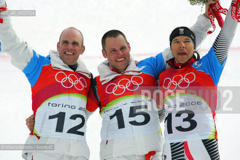 two brothers from switzerland philip and simon schoch won gold and silver medal, bronze for austrian siegfried grabner in snowboard psg, bardonecchia ©Alberto Ramella/Rosebud2