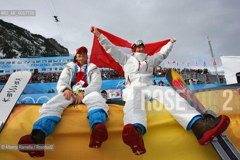 two brothers from switzerland philip and simon schoch won gold and silver medal, bronze for austrian siegfried grabner in snowboard psg, bardonecchia-in the pict fans from suisse ©Alberto Ramella/Rosebud2